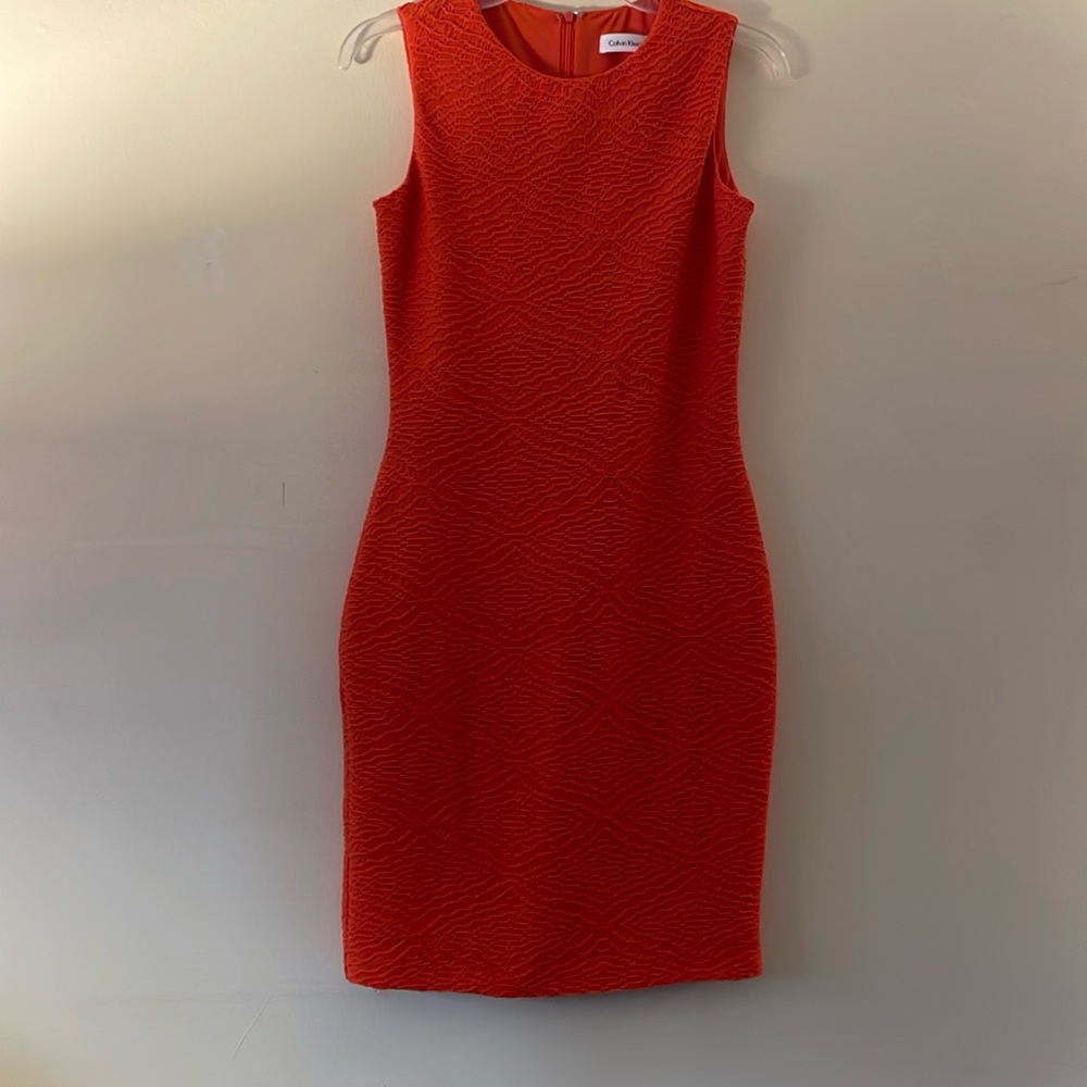 Calvin Klein Size 2. Orange Dress Lightly worn Smoke/pet free home